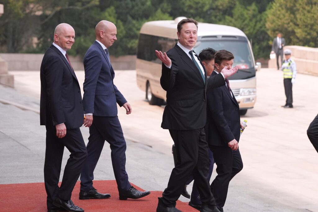 What impact did President Trump's visit to China have on the U.S. economy? trump china 002